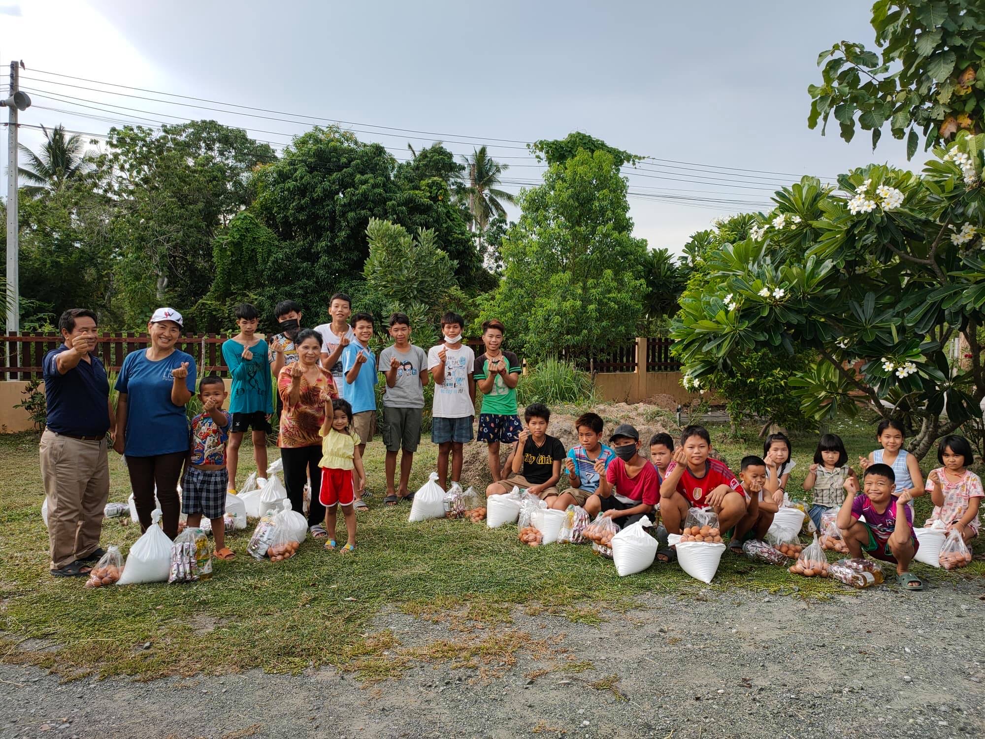 The Shan kids at Hua Fai Government School came to get food for their families
