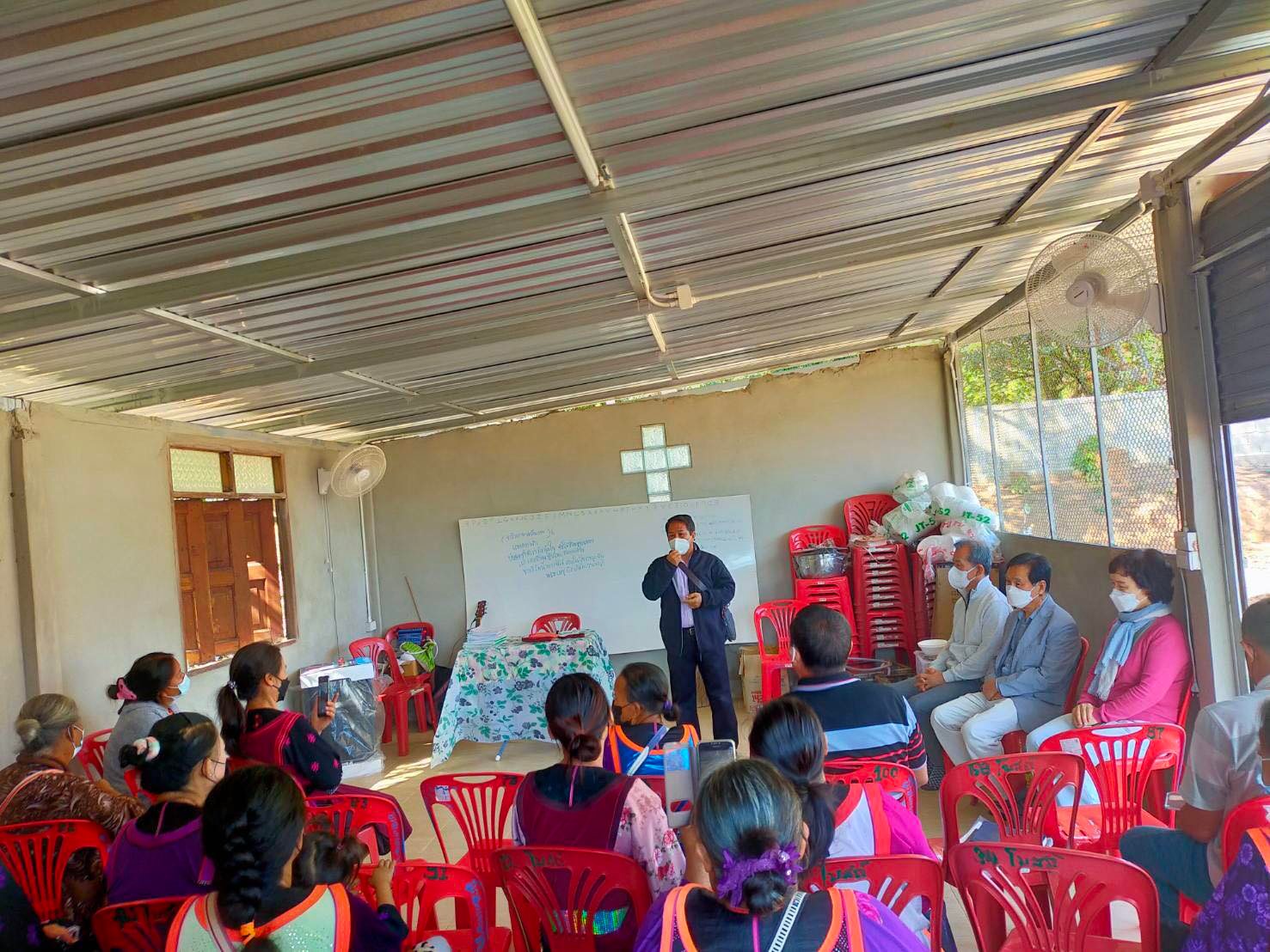 Stephen with his Korean friends visiting the church (Currently held in a storage shed)